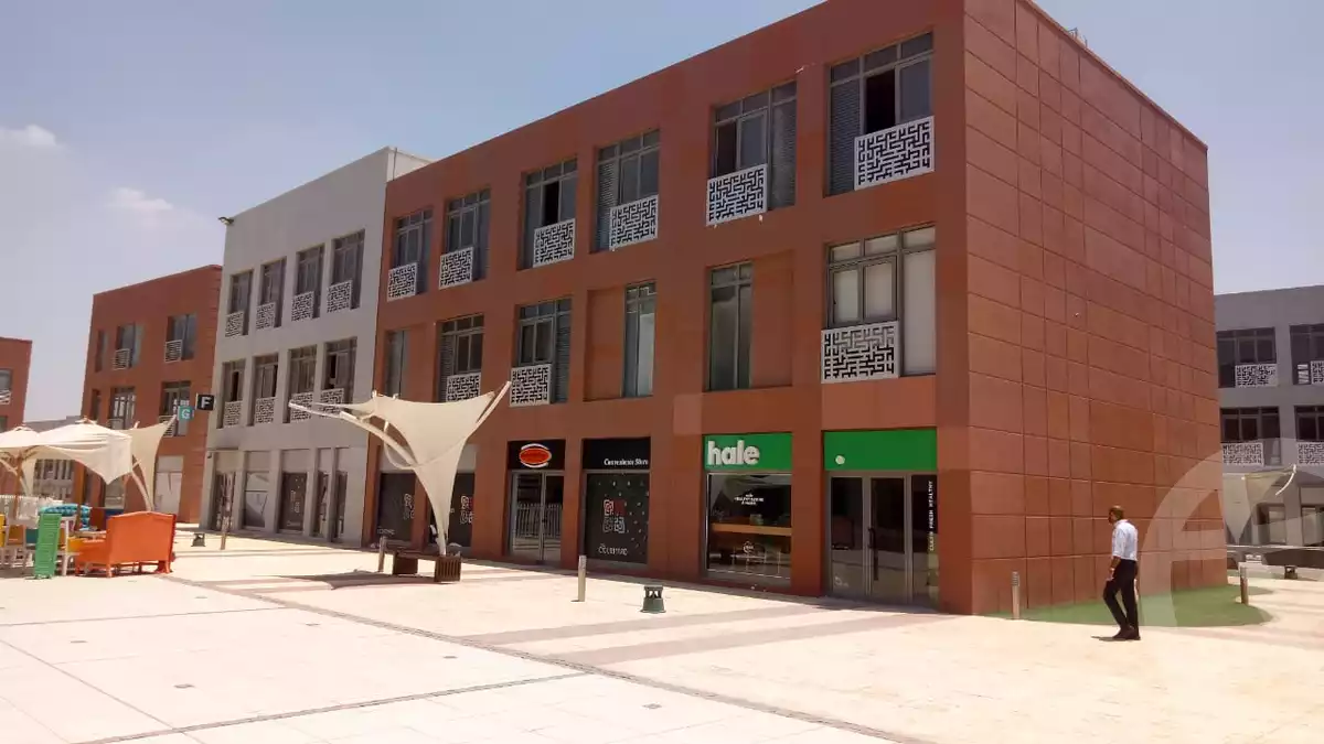 https://aqarmap.com.eg/ar/listing/4973882-for-sale-cairo-el-sheikh-zayed-city-compounds-the-courtyard-mall-dorra