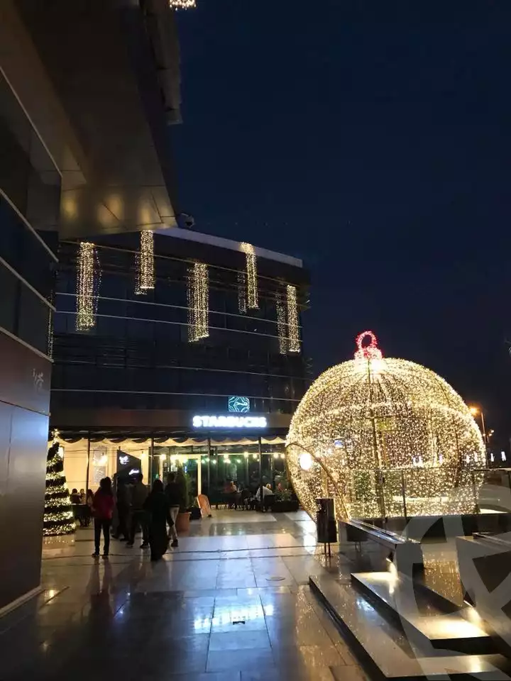 https://aqarmap.com.eg/ar/listing/5539796-for-sale-cairo-el-sheikh-zayed-city-compounds-majarrah-mall
