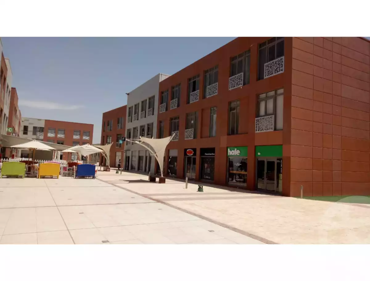 https://aqarmap.com.eg/ar/listing/5684024-for-sale-cairo-el-sheikh-zayed-city-compounds-the-courtyard-mall-dorra