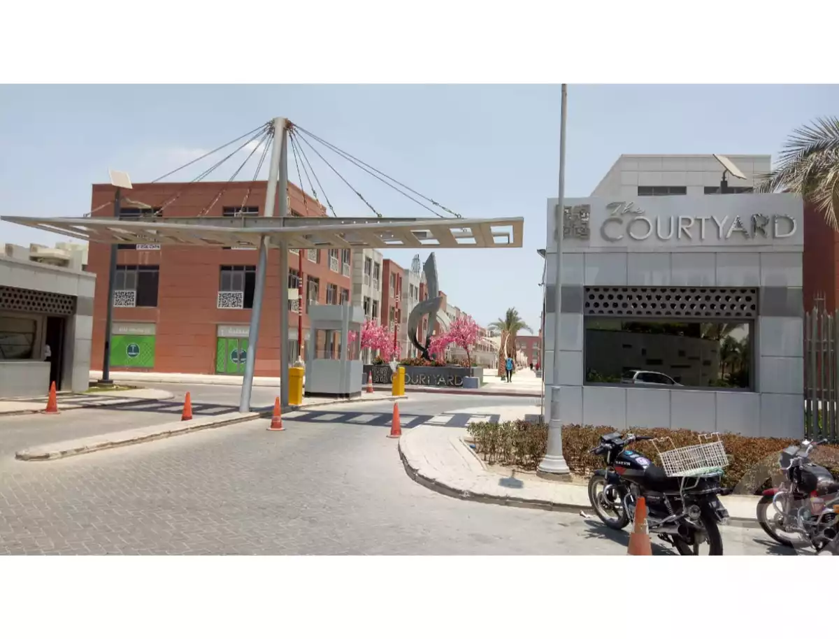 https://aqarmap.com.eg/ar/listing/5985868-for-sale-cairo-el-sheikh-zayed-city-compounds-the-courtyard-mall-dorra