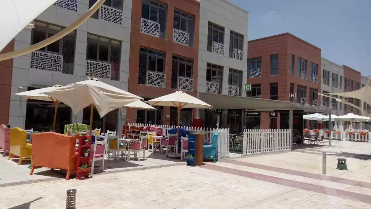 https://aqarmap.com.eg/ar/listing/6237997-for-sale-cairo-el-sheikh-zayed-city-compounds-the-courtyard-mall-dorra