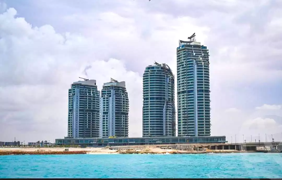 https://aqarmap.com.eg/ar/listing/7114760-for-sale-north-coast-new-alamein-mntj-t-l-lmyn-ljdyd-beachfront-tower-city-edge