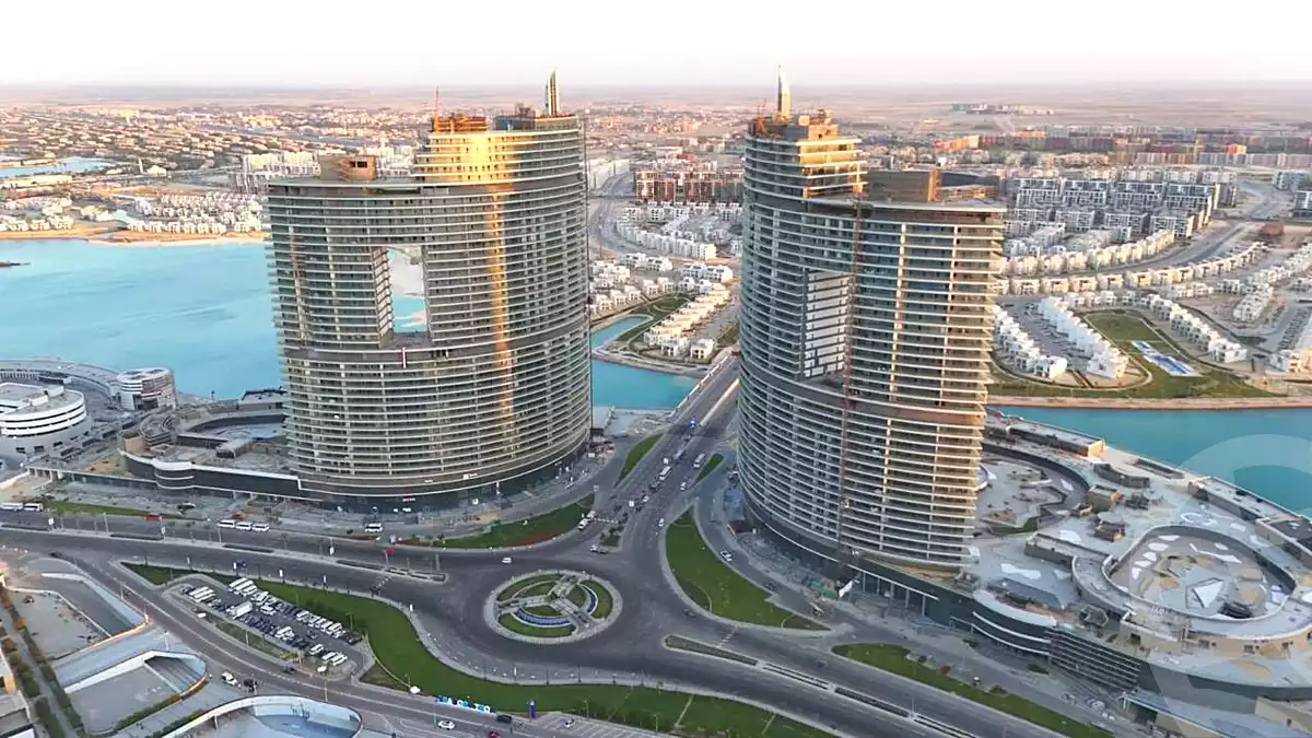 https://aqarmap.com.eg/ar/listing/7248799-for-sale-north-coast-new-alamein-mntj-t-l-lmyn-ljdyd-north-edge-towers