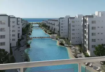 Ground floor apartment with garden for sale, sea view (Ariba Village) 90 km directly on the sea - 90 m + 44 m garden - 1,500,000 EGP (down payment + over)