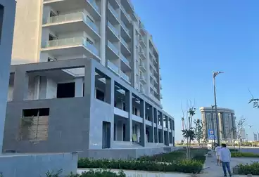 شقة للبيع العلمين الجديدة مزارين 144م امام فندقRixos بانوراماو بحري مقدم 5% فقط