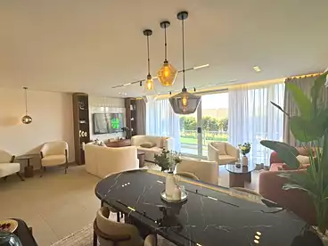Apartment with Garden For sale in Mar Ville Compound - AlMarasem, Expansion Of El Sheikh Zayed City, 166 sqm