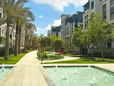 Duplex with Garden For sale in Trio Gardens Compound - M Squared, Compounds in New Cairo, 170 sqm