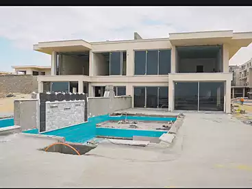 Chalet with Garden For sale in Direction White Resort - Arabella, North Coast Resorts, 60 sqm