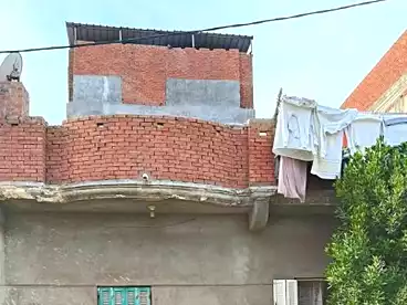 Building For sale in Ezbet Mohsen St., El Awayed, 100 sqm