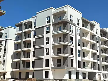 Apartment with Garden For sale in The Pearl Compound - SUD, New Mansoura City, 100 sqm