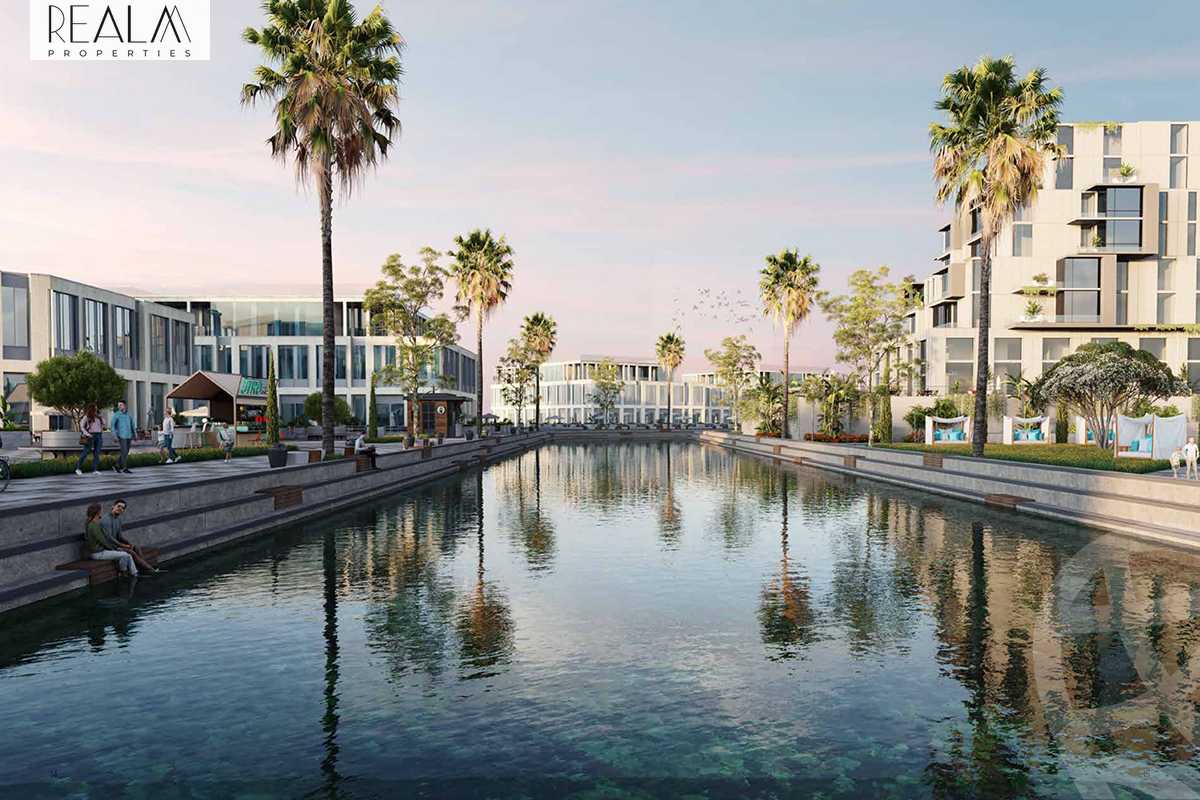 https://aqarmap.com.eg/ar/listing/4958779-for-sale-cairo-el-sheikh-zayed-city-compounds-canal-walk-island-205-compound-arkan-palm